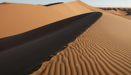 Majestic sand dunes, with sunlight casting dramatic shadows on the desert landscape