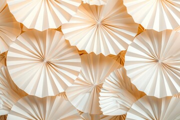 A large number of paper fans, arranged in a pattern that resembles a wave