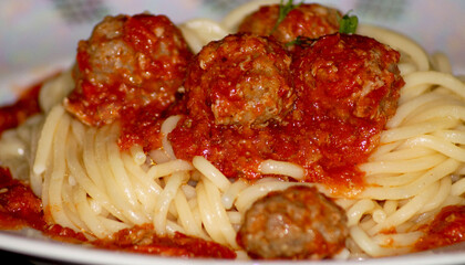 Spaghetti and meatballs with homemade tomato sauce . High quality photo
