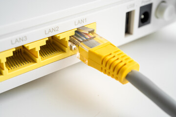 Ethernet cable with wireless router connect to internet service provider internet network.