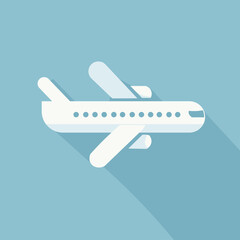 An airplane icon is completely white and has a shadow and background that matches the color of the sky
