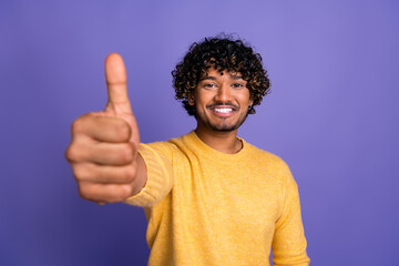 Photo of cheerful funny man wear trendy yellow clothes thumb up isolated on violet color background