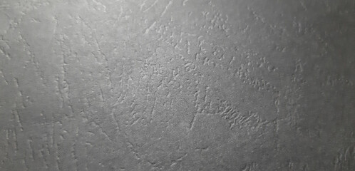 abstract dark leather like paper texture, close-up textured surface, beautiful background and wallpaper with space for design