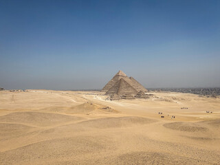 Ancient Pyramids of Giza, iconic Egyptian landmarks and tombs of pharaohs, symbolizing Egypt’s architectural and cultural heritage