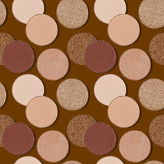 Seamless pattern with eye shadow swatches, beige brown tints, on chocolate color background. Round eyeshadows powder for makeup, cosmetics design minimal print, top view autumn mood beauty
