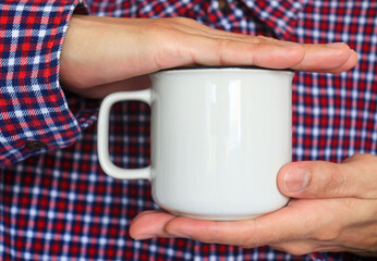 hand holding milk jug