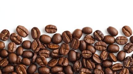 Fototapeta premium Freshly Roasted Coffee Beans Scattered on a White Background for Gourmet Beverage Concepts