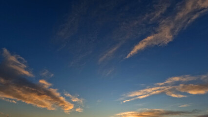 pretty sunset goldish clouds on the sky backdrop - photo of nature