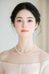 Elegant Portrait of a Woman Wearing a Pearl Necklace with Soft Expression