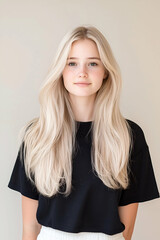 Naklejka premium Portrait of a Young Woman with Long Flowing Hair and Calm Expression