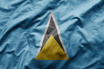 waving colorful realistic national flag of saint lucia .