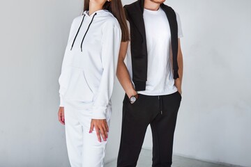 Casual matching outfits for men and women in hoodies