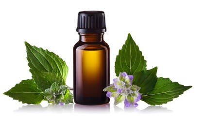 patchouli essential oil in a dark glass bottle