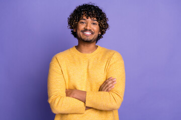 Photo of positive nice man wear trendy yellow clothes crossed arms isolated on purple color background