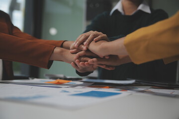 Hand join together for work togetherness, Hand stack for business and service, Team volunteering or teamwork. Concept connection of community and charity. Group of business workforce participation.