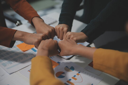 Hand join together for work togetherness, Hand stack for business and service, Team volunteering or teamwork. Concept connection of community and charity. Group of business workforce participation.