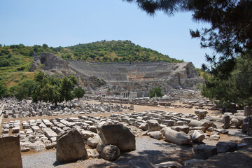 Tourists explore the ancient theater