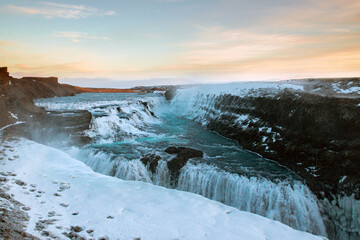 Beautiful scenic sunset view of Gullfoss waterfall on the Hvíta river in Iceland. 