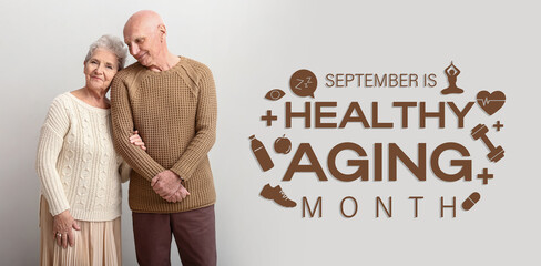 Portrait of senior couple on white background