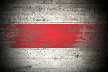 Flag of Belarus on rough concrete wall