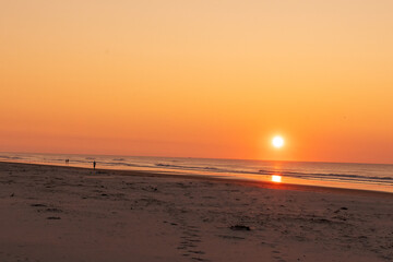 Avalon, New Jersey, USA - Ocean waves at sunrise off the beach in Avalon New Jersey on the southern New Jersey shore south of Atlantic City
