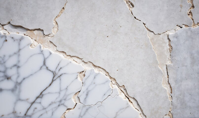 Fototapeta premium A close-up of a white marble surface with cracks