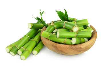 Green bamboo with leaves in wooden bowl isolated on white background with full depth of field