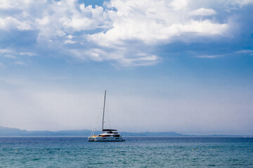 Fototapeta premium rocky coastline with a blue sky full of summer colors