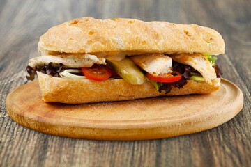 Tasty fresh big sandwich with ham, and vegetables