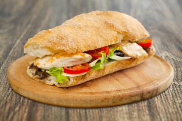 Tasty fresh big sandwich with ham, and vegetables