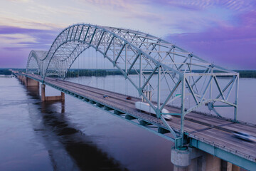 Hernando de Soto Bridge crossing the Mississippi River at sunrise. Memphis, Tennessee, United States.