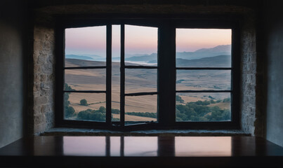 A window overlooking a rolling landscape, with a misty horizon in the distance