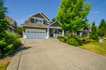 Houses in suburb at Summer in the north America. Luxury houses with nice landscape.
