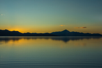 View of Salar de Uyuni (Uyuni Salt Flat) by the sunset - Bolivia