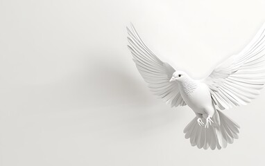 Fototapeta premium A white dove in flight against a white background, symbolizing peace, hope, and freedom.