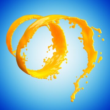 orange juice splash isolated on blue background