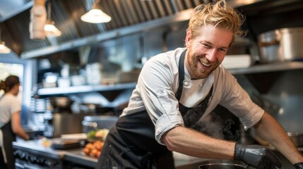 Happy Chef Cooking in a Busy Kitchen.