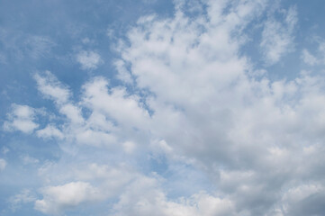gentle white clouds in the blue sky