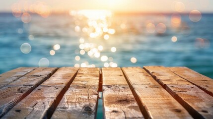 A rustic wooden dock facing the ocean, illuminated by the golden glow of a sunset with bokeh light reflections on the water. - Powered by Adobe