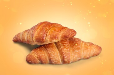 Freshly baked tasty croissant on the desk