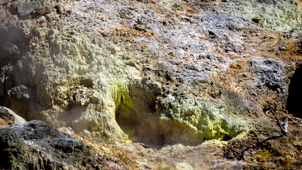 The hill on Sikidang Crater (kawah sikidang) full of smoke and sulfur, one of the famous tourist destinations in Wonosobo.