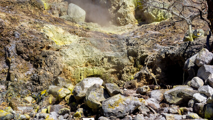 The hill on Sikidang Crater (kawah sikidang) full of smoke and sulfur, one of the famous tourist destinations in Wonosobo.
