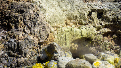 The hill on Sikidang Crater (kawah sikidang) full of smoke and sulfur, one of the famous tourist destinations in Wonosobo.