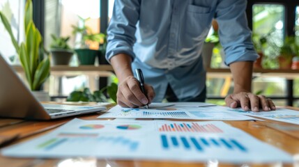 Fototapeta premium Sales manager, side view, with sales reports on table in office generative ai