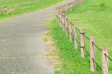 A paved road in the grassland