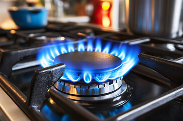blue flame from an open gas stove