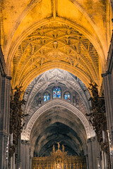 Inside view of the walls and windows in Sevilla Cathedral.