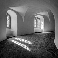Brick walkway with window.