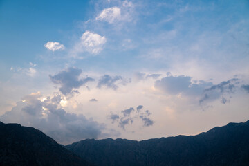 Majestic sky at dusk, mountains in foreground 