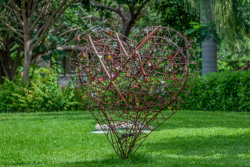 Metal heart with padlocks as a symbol of union